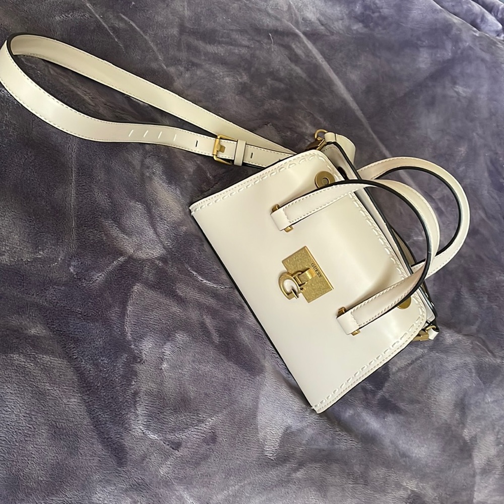 Guess Stephi mini satchel. Light rum color I believe.